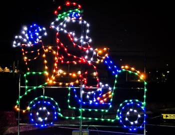 Christmas lights of Santa on golf cart